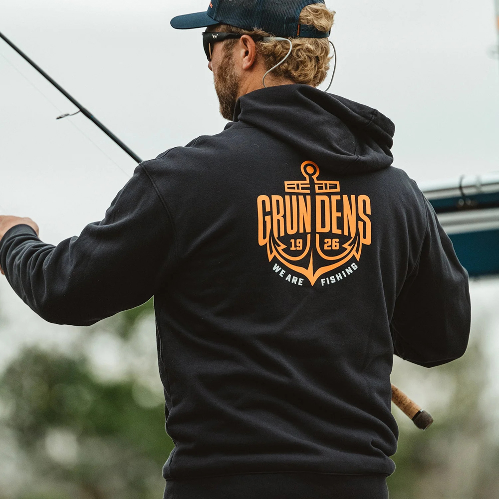 P-27612_Grundens_Displacement_DWR_Hoodie_Logo_Anchor_Black_Lifestyle_8